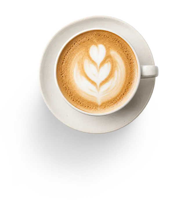 A latte served to a regular guest at a café counter